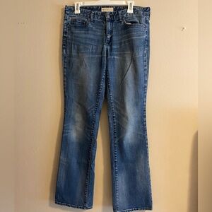 Medium wash mid rise boot cut jeans